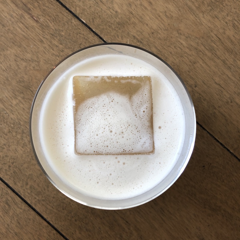 whiskey sour cocktail with large ice